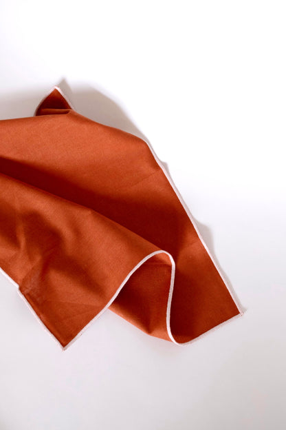 Line Napkin - Rust/Salmon Piping